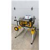 Image 1 : DeWalt DW745 Heavy-Duty 10” Job Site Table Saw, Rolling Stand, and Manuals