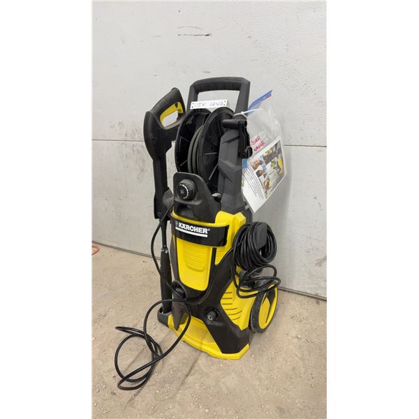 Kärcher Electric Pressure Washer with Hose Reel, Wand, and Instruction Manual