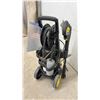 Image 6 : Kärcher Electric Pressure Washer with Hose Reel, Wand, and Instruction Manual