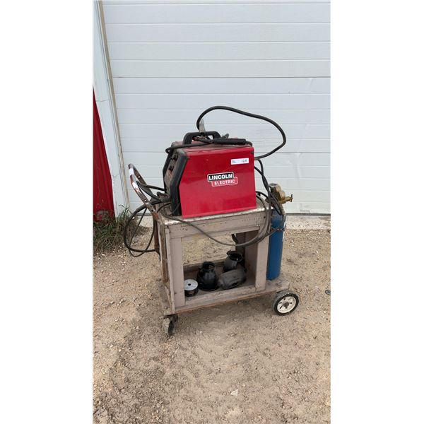 Lincoln Electric SP-125 Plus MIG Welder, BlueShield Gas Tank, and Welding Cart