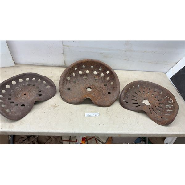 Three Antique Metal Tractor Implement Seats