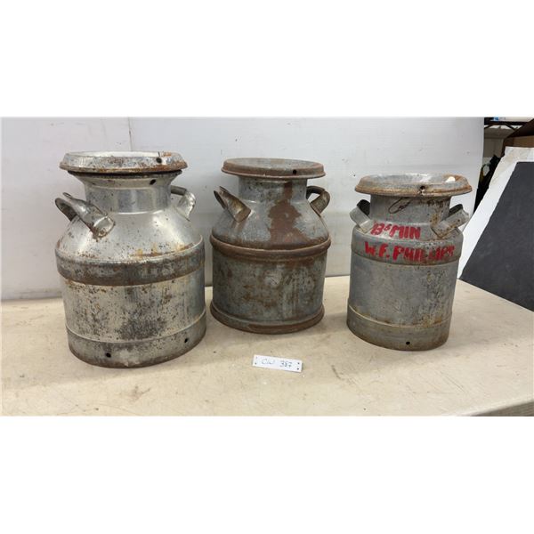 Three Vintage Galvanized Steel Milk Cans with Painted Identifiers, Including W.F. Phillips