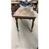 Image 4 : Antique Wooden Table with Turned Legs and Yellow-Painted Metal Leg Extenders on Casters