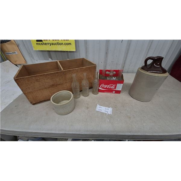 Stoneware Jug, Wooden Crate, Ribbed Ceramic Pot and Coca-Cola Bottles in Carrier