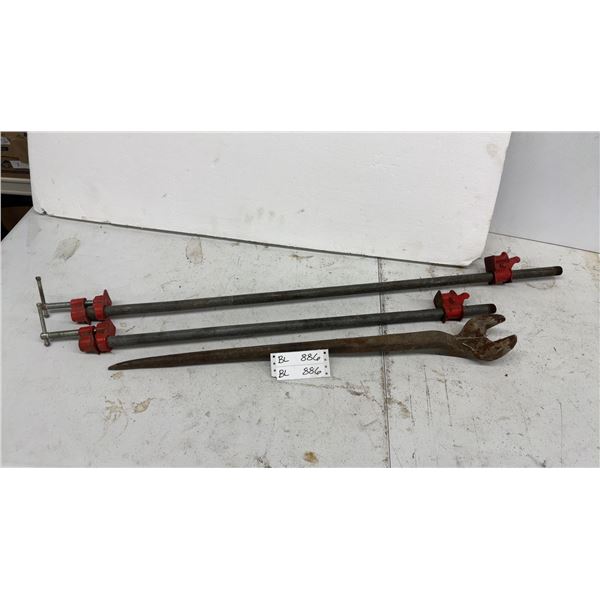 Two Pipe Clamps and Large Wrench
