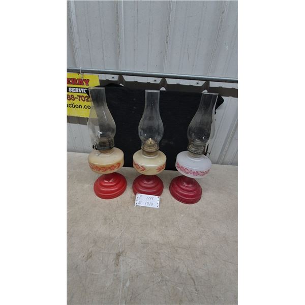 Set of Three Vintage Tabletop Oil Lamps with Red Floral Decal Fonts and Fluted Red Bases