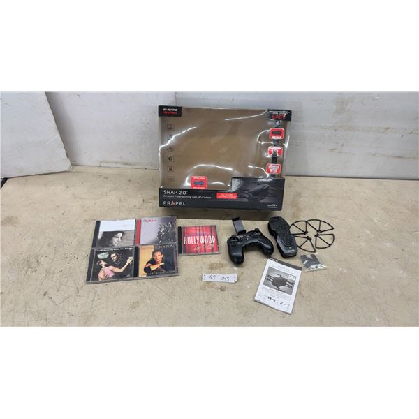 Propel Snap 2.0 Compact Folding Drone with 720p HD Camera, Controller, and Five CD’s