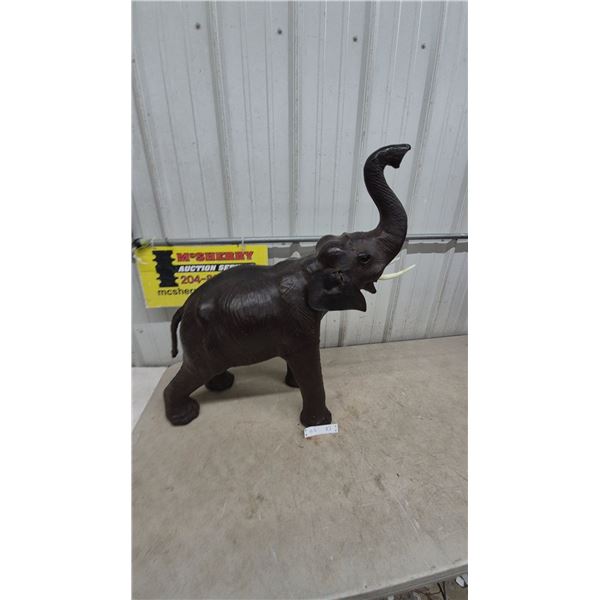 Large Leather Elephant Statue with Raised Trunk and Tusks. 31” to top of trunk