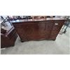 Image 1 : Traditional Dark Wood Serpentine Front Dresser with Oval Inlay and Multiple Drawers. 38”×70”×20”