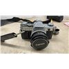 Image 2 : Canon AT-1 35mm SLR Camera with FD 50mm Lens, Additional Lenses, Flash, and Hard Case