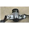 Image 3 : Canon AT-1 35mm SLR Camera with FD 50mm Lens, Additional Lenses, Flash, and Hard Case