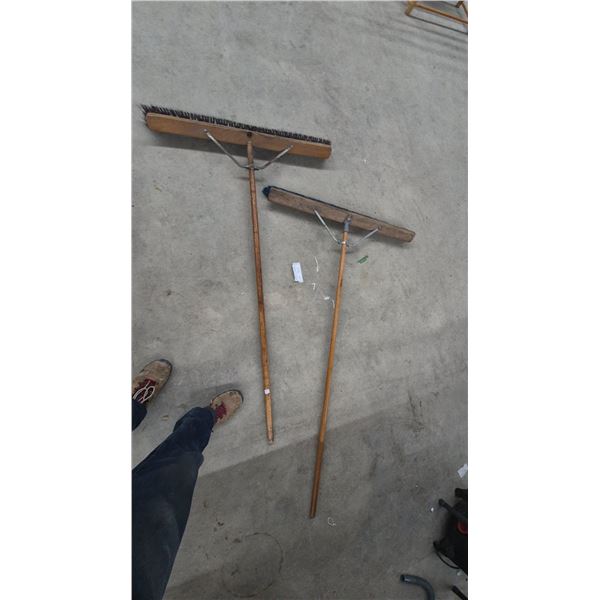 Two Heavy-Duty Industrial Push Brooms with Wooden Handles, Brown and Blue Bristles