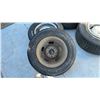 Image 6 : 4 Staggered Chevy 5 Bolt Rims with Rings and Centre Caps: 2 14” Rims on 205/70R14 Tires and 2 15”