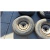Image 11 : 4 15” 5 Bolt Steel Rims with Mixed Tires: Bridgestone 235/75R15, Bridgestone 225/75R15