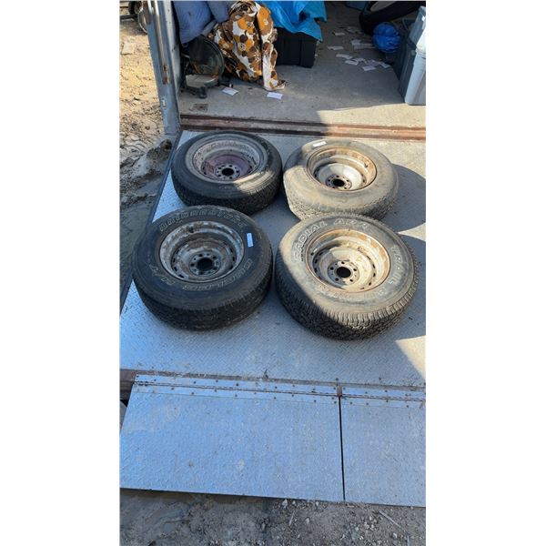 4 15” 5 Bolt Steel Rims with Mixed Tires: Bridgestone 235/75R15, Bridgestone 225/75R15