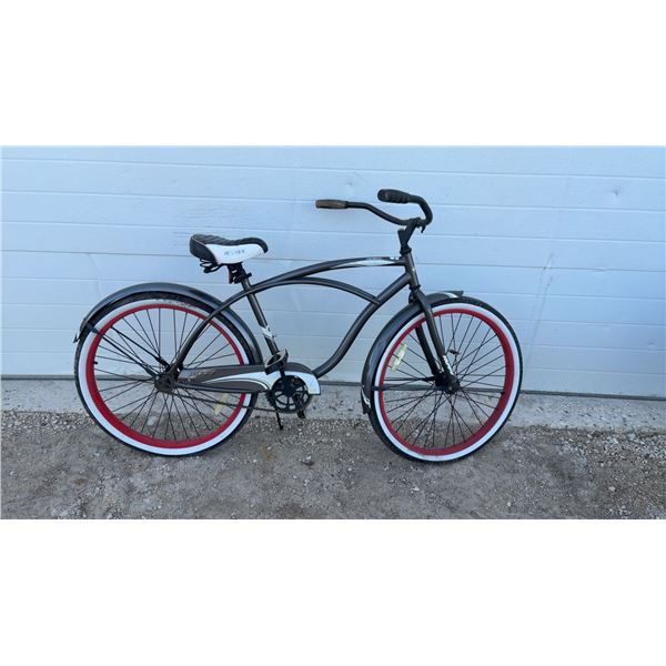 Huffy Cruiser Bicycle with Red Rims, White Wall Tires, and Huffy Saddle