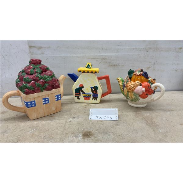 Set of Three Decorative Ceramic Teapots: Strawberry Basket, Sombrero, and Harvest Fruit Designs