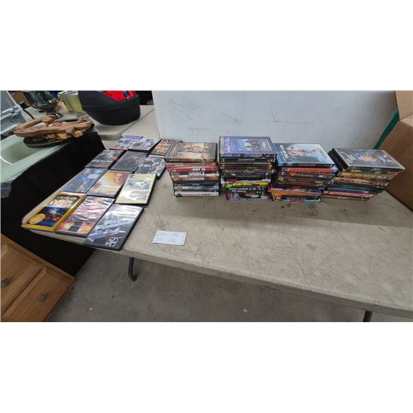 Large Lot of Approx. 65 DVDs Including Fast Five, Transformers, John Wayne, Street Fighter, Troy