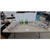 Image 1 : 24 Vintage Soda Bottles: Sun Crest, Mission, Stubby, Wynola, Fresca, Sprite, Mountain Dew