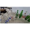 Image 5 : 24 Vintage Soda Bottles: Sun Crest, Mission, Stubby, Wynola, Fresca, Sprite, Mountain Dew