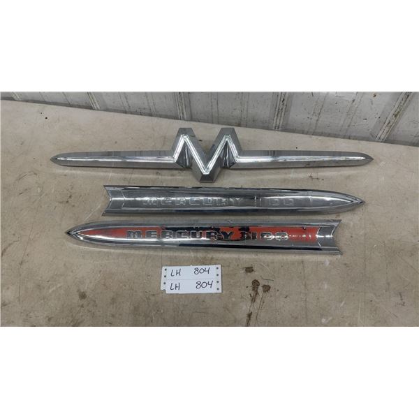 Mercury Hood Ornament and 2 Mercury 100 Side Trim Pieces