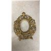 Image 3 : Antique Brass and Cast Metal Lot: Vanity Mirror Frame, Picture Frame, Wall Plaque