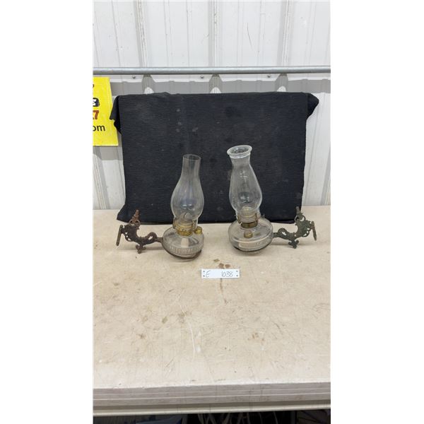 Pair of Antique Wall-Mount Oil Lamps With Clear Glass Founts and Ornate Cast Iron Brackets