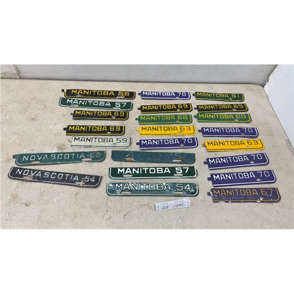 Collection of Vintage Manitoba and Nova Scotia License Plate Year Tabs, 1954-1970