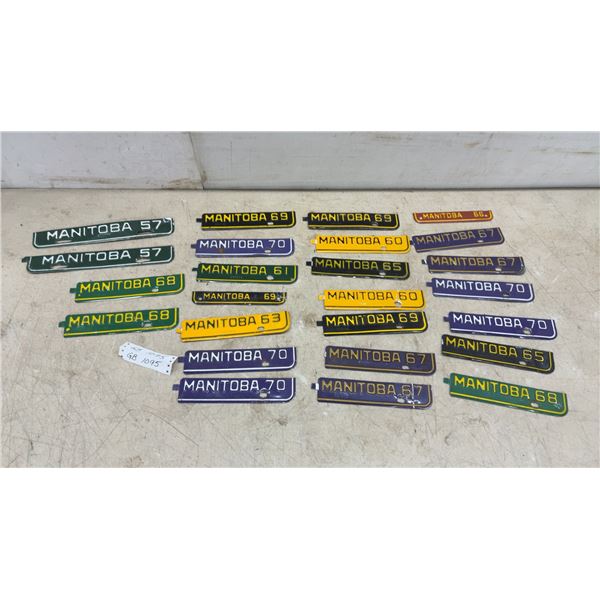 Collection of Vintage Manitoba License Plate Year Tabs 1957-1970