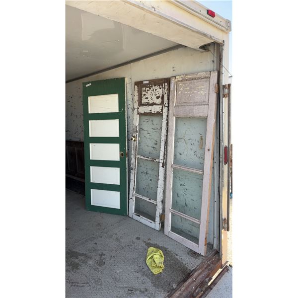 3 Vintage Wooden Doors, 2 with Glass and 1 Painted Green and Blue, 22” × 72” and 28” × 76”
