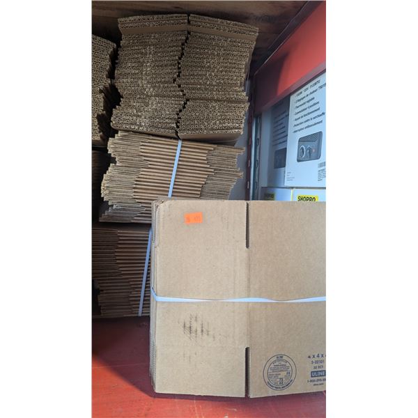 Four Stacks of 4 x 4 x 4 ULINE Boxes