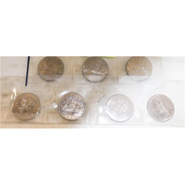 SHEET OF 7 $1 COINS CANADIAN