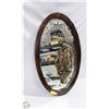 Image 1 : DARK WOOD OVAL MIRROR WITH DECORATIVE FLORAL