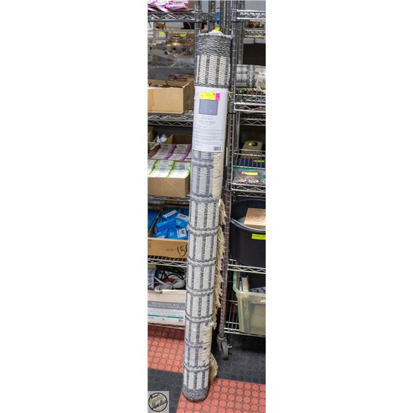 NEW 5'2" X 6'7" INDOOR/OUTDOOR PATIO RUG