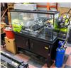 Image 1 : 50 GALLON FISH TANK COMES WITH DECORATIONS &