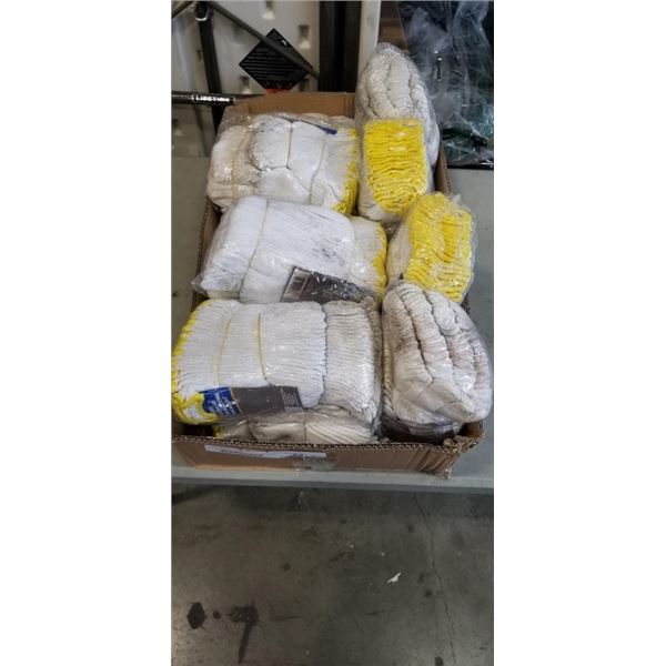 11 PACKS OF POWER FIST LARGE LINER GLOVES (12 PAIRS PER PACK). NEW BUT HAS GOTTEN DAMP