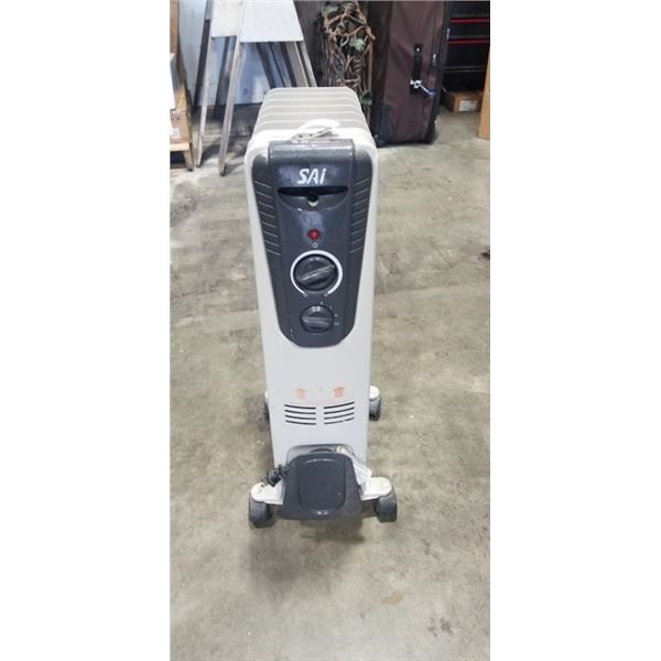 SAI OIL FILLED RADIATOR. MODEL CYAA45-7. WORKING