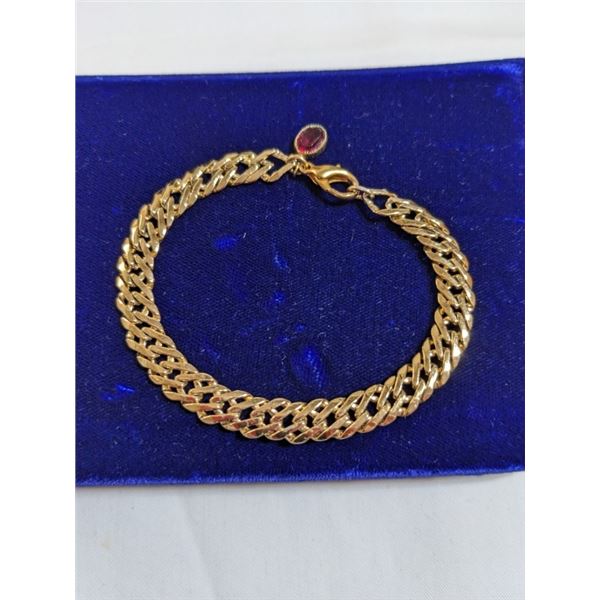 18K GOLD PLATED BRACELET W/ ONE CHARM SET W/ RED GARNET STONE