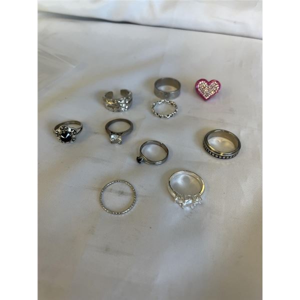 ASSORTED SILVER TONE RINGS