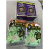 Image 1 : 2 HALLOWEEN  MOTION LIGHTS AND 2 BAGS OF GREEN WEBBING