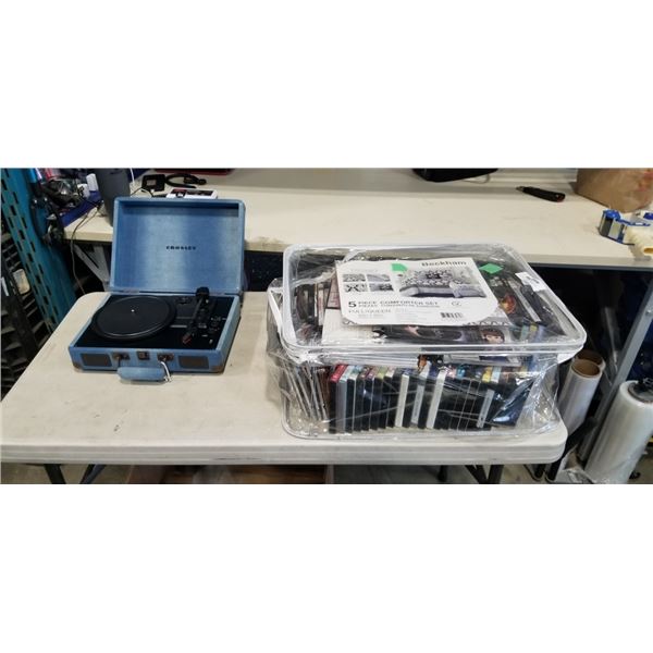 ASSORTED DVD'S AND CD'S, AND CROSLEY PORTABLE RECORD PLAYER