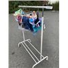 Image 1 : CLOTHES RACK WITH NEW KIDS CLOTHING SIZE 6- 12 RACK INCLUDED 30+ PCS