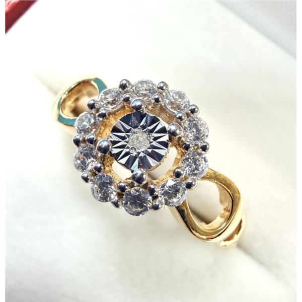 GOLD PLATED STERLING SILVER NATURAL DIAMOND WITH CZ RING, SIZE 8, W/A $700.00. DIAMOND IS THE BIRTHS