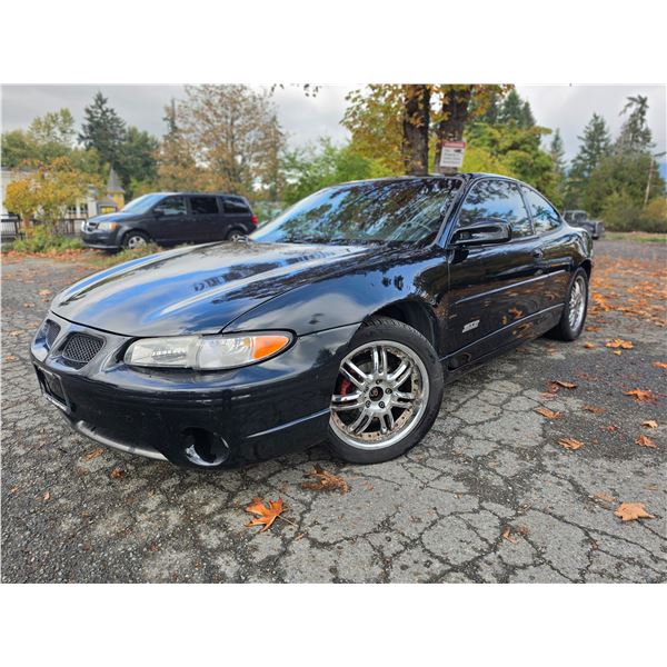 DUNCAN - 1999 PONTIAC GRAND PRIX BLACK 204304 KMS - 249604-1
