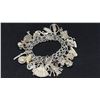 Image 1 : APPROX 10K CHAIN (17") WITH APPROX 10K PENDANT (3.7G) & SILVER CHARM BRACELET WITH MULTIPLE SILVER