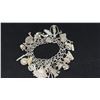 Image 2 : APPROX 10K CHAIN (17") WITH APPROX 10K PENDANT (3.7G) & SILVER CHARM BRACELET WITH MULTIPLE SILVER