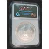 Image 2 : 285. 2005 American Eagle Dollar. Slabbed NGC Gem Uncirculated.