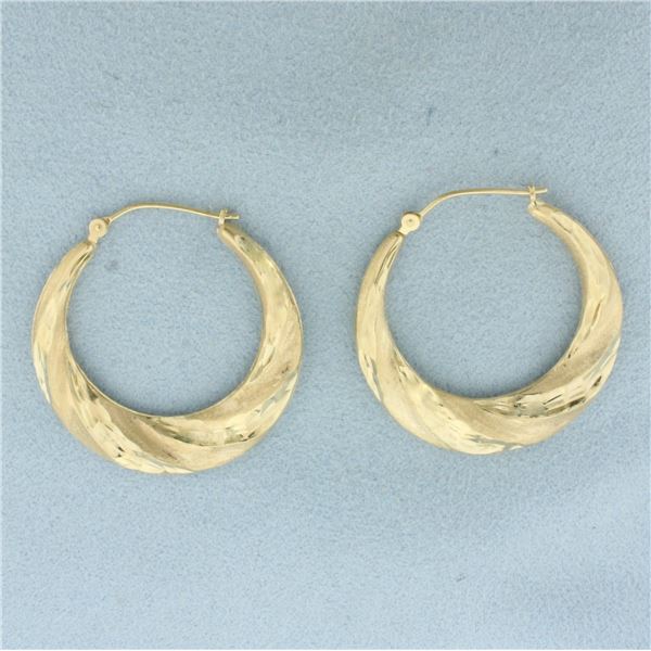Diamond Cut Twisting Hoop Earrings in 14k Yellow Gold