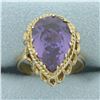 Image 1 : Color Changing Lab Alexandrite Ring in 14k Yellow Gold