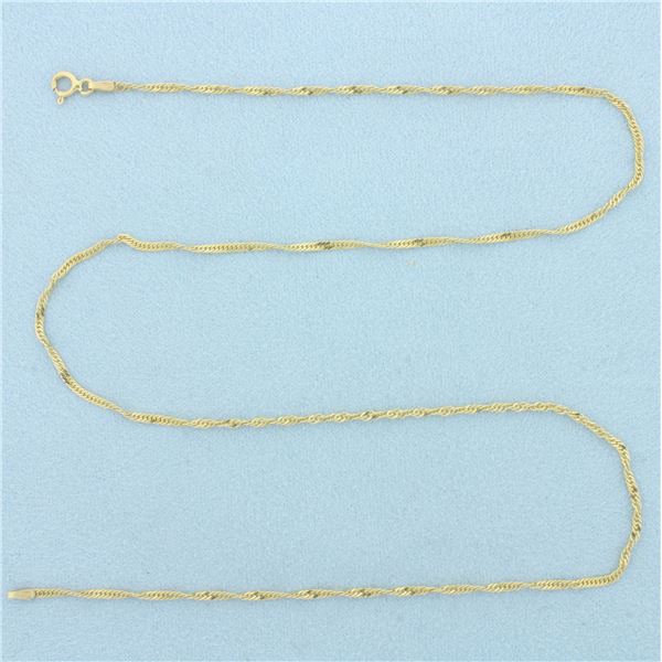 18 Inch Italian Twisting Curb Link Chain Necklace in 14k Yellow Gold
